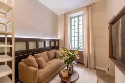 a living room with a couch and a window at 2BDR 6P central A C apt - heart of Nice - Beach in Nice