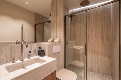 a bathroom with a shower and a sink and a toilet at 2BDR 6P central A C apt - heart of Nice - Beach in Nice