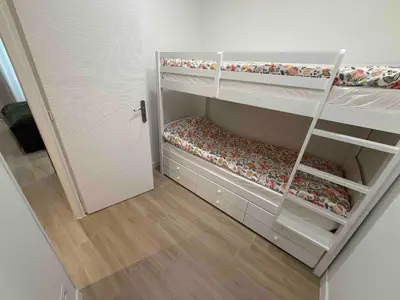 a small room with two bunk beds in it at Nikaia Residence - 2BR Central Nice Close to Everything in Nice