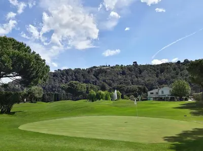 a view of a golf course with a green field at Studio Azur in Nice