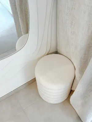 a chair in a room with a window at Aya - Renovated air-conditioned duplex with garden in Nice