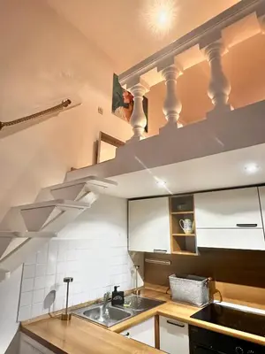 a kitchen with a sink and a counter top at Vieux Nice bord de mer in Nice