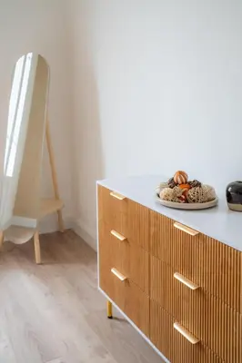 a dresser in a room with a plate of food at Elegant apartment - Haut Musiciens in Nice