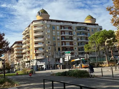 a large building with a dome on the top of it at Palais Des Domes Adagio Aparthotel in Nice