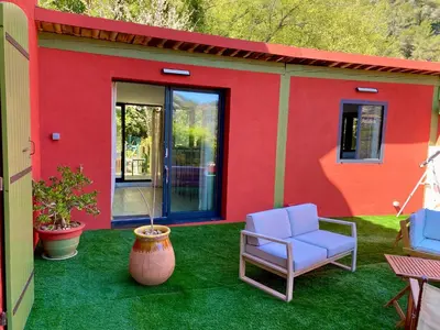 a grill sitting on a patio in a garden at Casa Balija in Tourrette-Levens