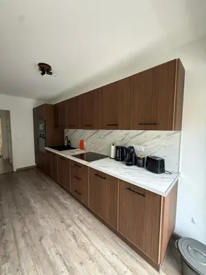 a bathroom with a washing machine and a shower at Appartement 3p proche mer in Nice