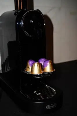 a toaster oven with gold and purple bells on it at La Verrière du Vieux Nice in Nice