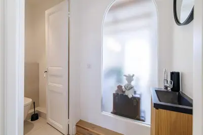 a bathroom with a sink and a mirror at MY CASA - EMMANUEL - Cozy apartment with Port view in Nice
