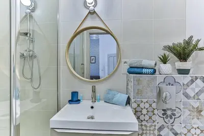 a bathroom with a sink and a mirror at GROSSO 1 MD - New 3 minutes from the Sea in Nice
