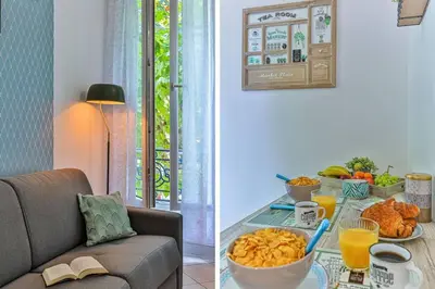 a table with a bowl of food and a bowl of orange juice at GROSSO 1 MD - New 3 minutes from the Sea in Nice
