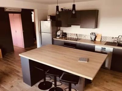a kitchen with a wooden counter top in a room at Villa Muse in Villefranche-sur-Mer