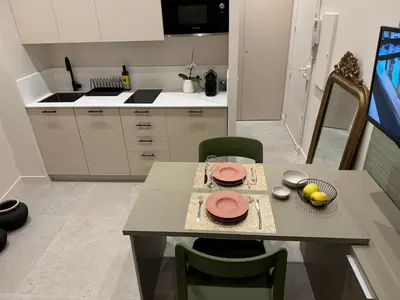 a kitchen with a table with plates on it at 10 Félix Faure, Nice in Nice