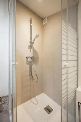 a shower with a glass door in a bathroom at Le Panoramique - Vieux-Nice in Nice