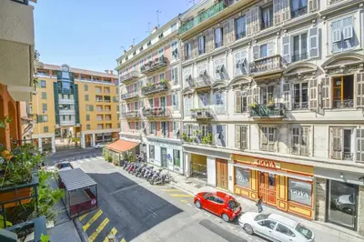 an overhead view of a city street with buildings at Bright modern studio, Nice Port, walk to tram and beach! in Nice