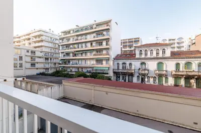 a view of a city from a balcony with buildings at PROM 92 - Amazing Sea View 3 rooms with terrace in Nice