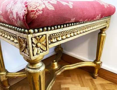 a golden stool with a pink cushion on top of it at Vue Mer Panoramique - Terrasse - Climatisation - 2 Bedrooms - Wifi - Cuisine - Tramway in Nice