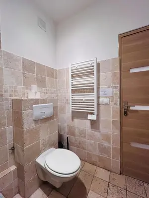 a bathroom with a toilet and a window and a door at Old Town Immersion-Breakfast-Central-Self Check-in in Nice