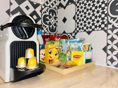 a counter top with a tray of food and a mixer at Old Town Immersion-Breakfast-Central-Self Check-in in Nice