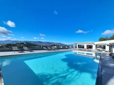 a swimming pool with a view of the mountains at Domaine Datcha - La Dolce Vita, en toute intimité in Aspremont