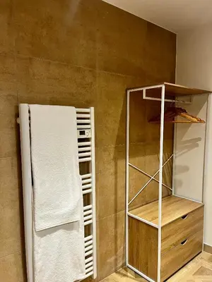 a towel rack in a bathroom with a towel at Appartement Jasmin 2 pièces central à Cagnes-sur-Mer in Cagnes-sur-Mer