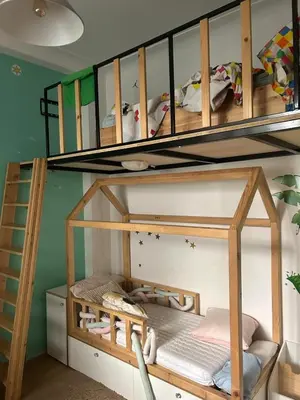 a bunk bed in a room with bunk beds at Elegant apartment in Nice with a private garden in Nice