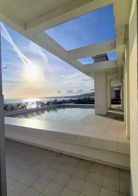 a view from the balcony of a house with a swimming pool at Royal Luxembourg Nice Prom' in Nice
