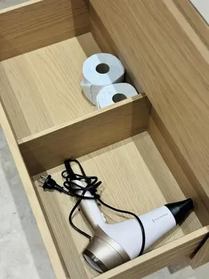 a wooden box with two rolls of toilet paper at Luxury Beachfront 2BR Promenade des Anglais in Nice