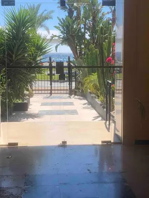 an open door with a view of the ocean at Super flat in Carré d'Or - 1 minute from the sea in Nice