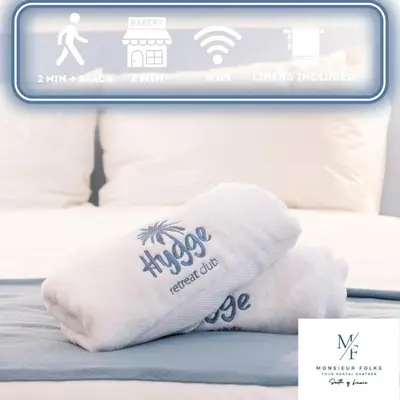 a white pillow sitting on top of a bed at 2 bedroom apartment in the center of Nice old town in Nice