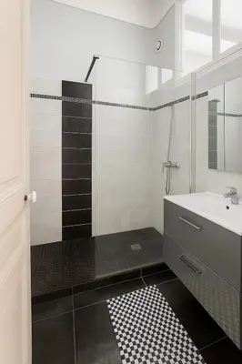 a bathroom with a shower and a sink and a tub at Large 1 bedroom apartment, balcony, very central Nice in Nice