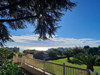 a view of a park with a wooden fence at Heaven Nice in Nice