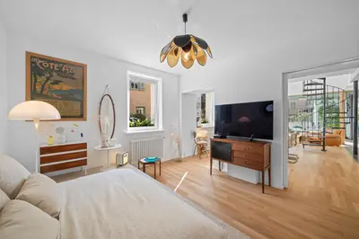 a living room with a couch and a flat screen tv at Maison Nice - Plage 300m - Parking in Nice