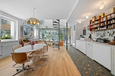 a kitchen and dining room with a table and chairs at Maison Nice - Plage 300m - Parking in Nice