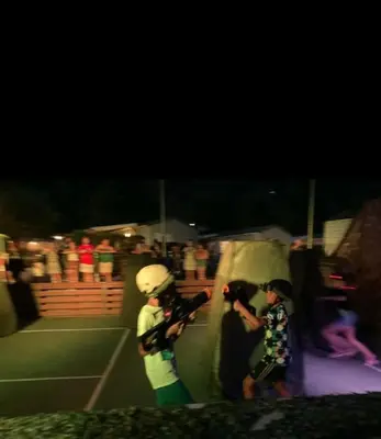 two young boys are standing on a skateboard ramp at Mobilhome Camping 4 étoiles in Cagnes-sur-Mer