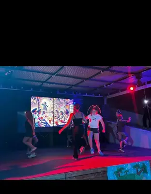 a group of people dancing on a stage at Mobilhome Camping 4 étoiles in Cagnes-sur-Mer