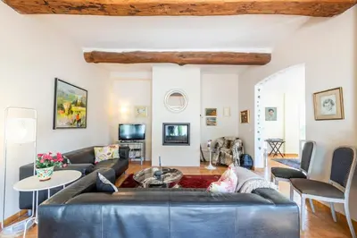 a living room with a couch and a table at Villa in Cagnes-sur-Mer in Cagnes-sur-Mer