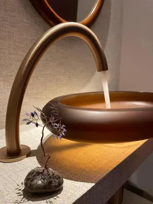 a bowl with a stream of water coming out of it at Chambre Gounod in Nice