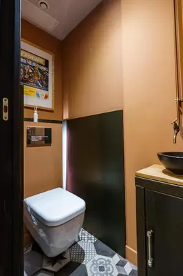 a bathroom with a toilet and a sink at Loft proche du port de Nice - 6 pers - Parking in Nice