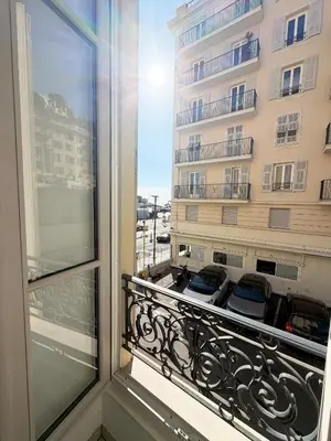 a balcony with a view of a building at Lympia Riviera Residence in Nice