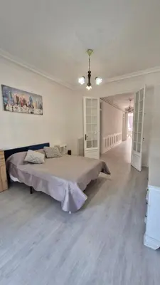 a large bedroom with a large bed in a room at Chateauneuf in Nice