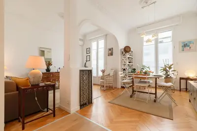 a living room with a table and a dining room at Maison Bianchi - Durante - downtown in Nice