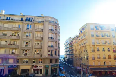 two tall buildings next to each other on a street at Nestor&Jeeves - CARDELINE TERRASSE - Very close sea - Spacious in Nice