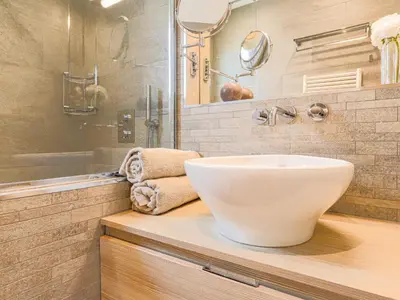 a bathroom with a white sink and a shower at Apartment Saint Christophe by Interhome in Nice