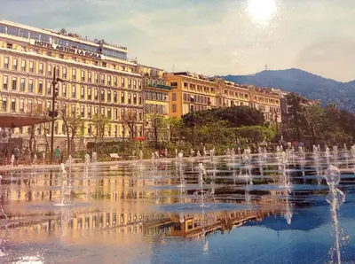 a water fountain in front of a building at Villa Lympia in Nice