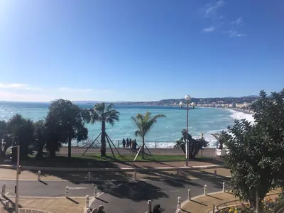 a view of the beach and the ocean at Les Grimaldines - Maison d'Hôtes in Cagnes-sur-Mer