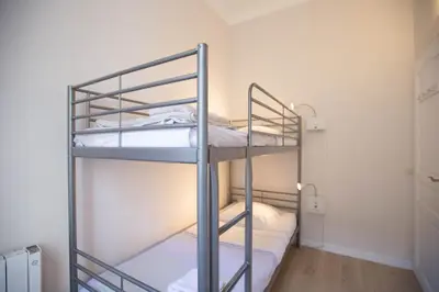 a bunk bed room with two bunk beds at Le Coin Du Marché in Nice