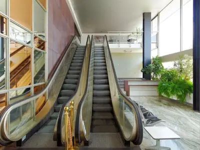 a staircase in a building with a slide at Le Paradis Blue in Nice