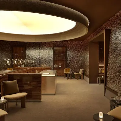 a lobby with a large circular light on the ceiling at Hotel Gounod Fully Renovated in Nice