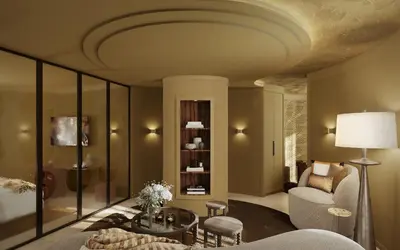 a living room with a couch and a table at Hotel Gounod Fully Renovated in Nice