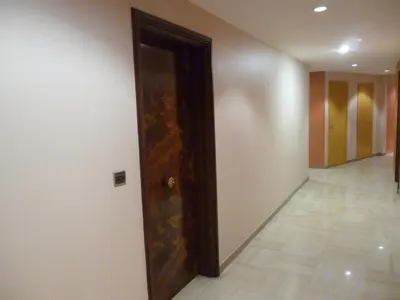 a door in a room with a hallway at Nice-Miramar Apartment and Parking in Nice